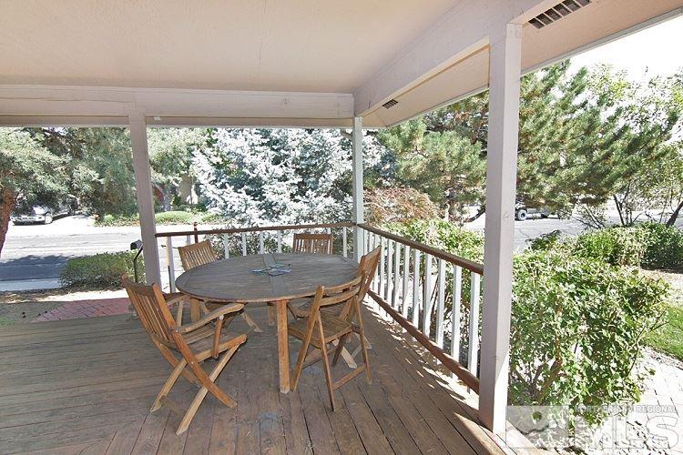 560 Citadel Road Reno, NV 89503 - Photo 3 of 25 a view of a porch with furniture and wooden floor