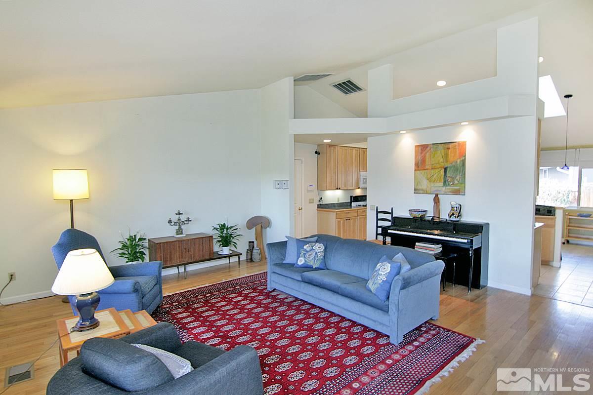 560 Citadel Road Reno, NV 89503 - Photo 7 of 25 a living room with furniture and wooden floor