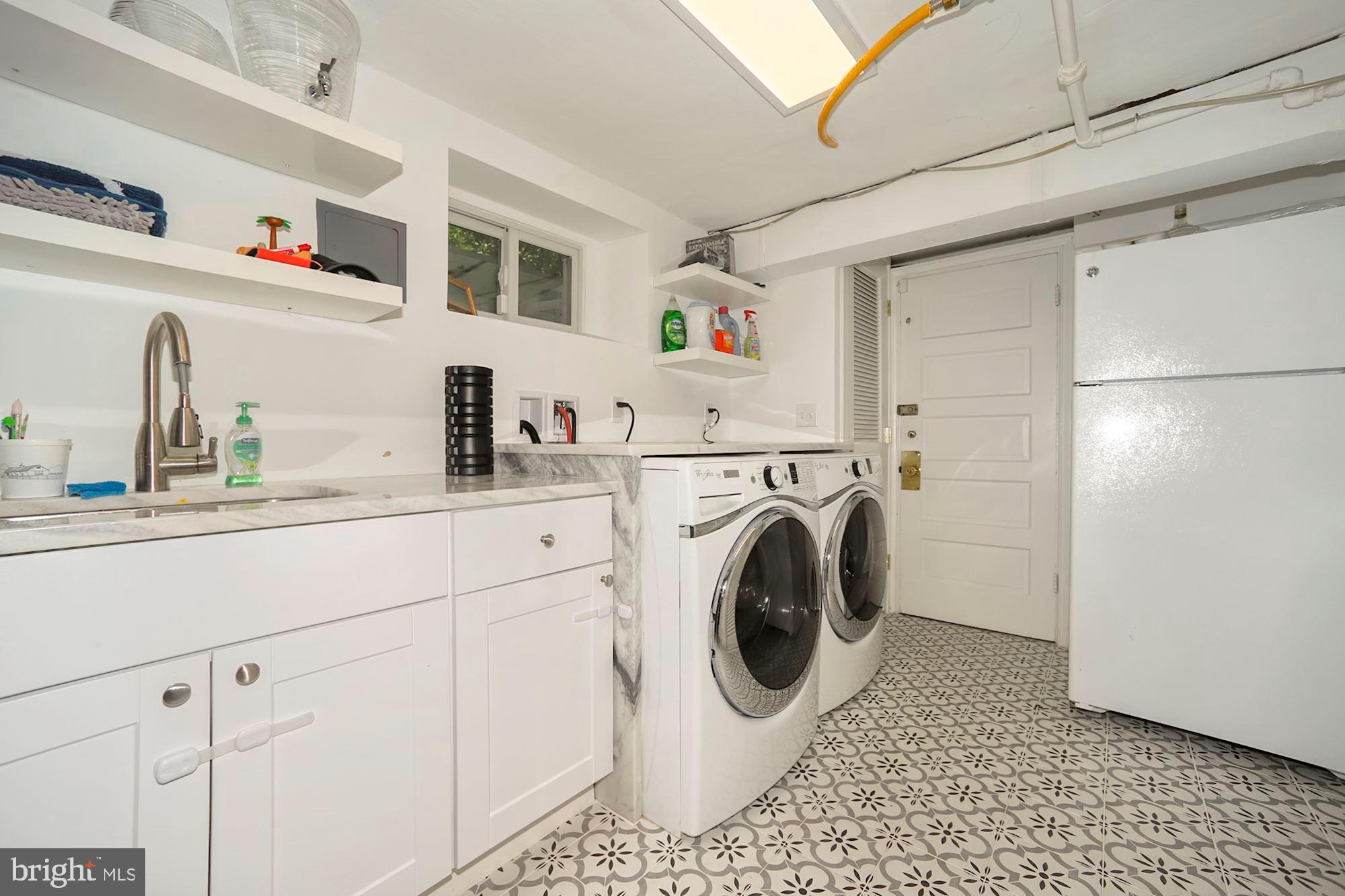3812 Fordham Road Northwest Washington, DC 20016 - Photo 22 of 28 Basement Laundry Room with Garage Entry
