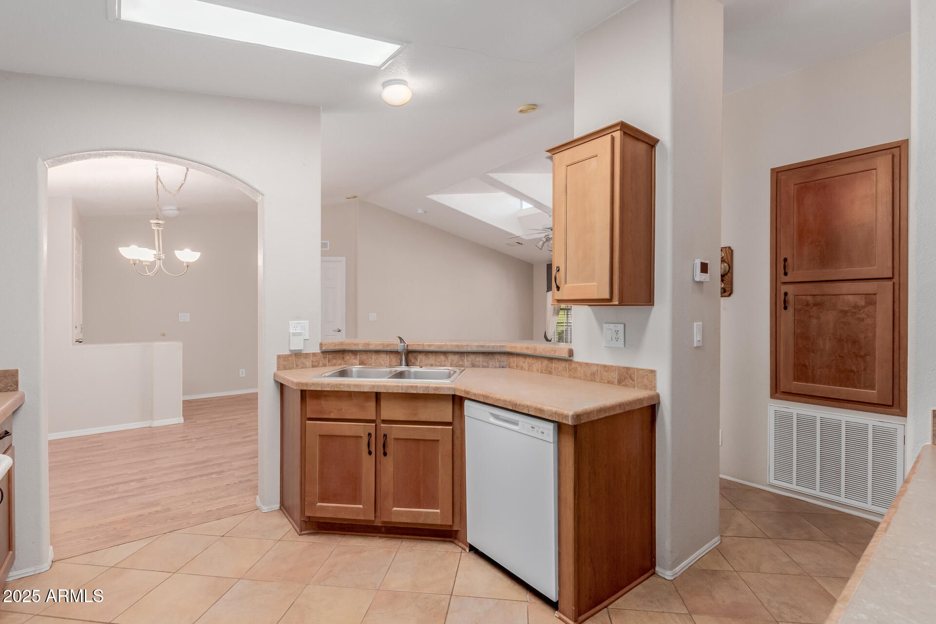 2550 South Ellsworth Road, Unit 366 Mesa, AZ 85209 - Photo 11 of 27 a kitchen with a stove and a refrigerator