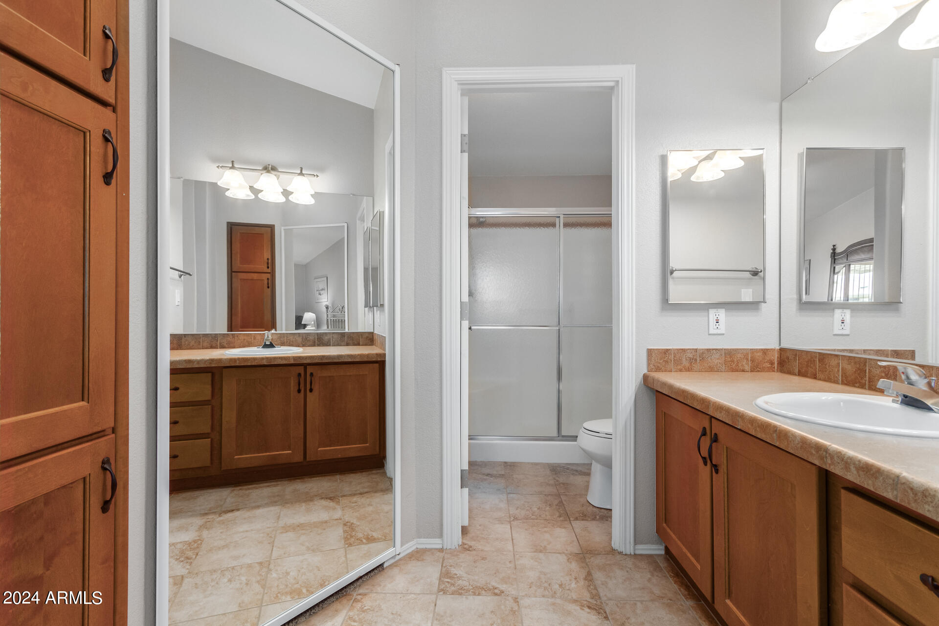2550 South Ellsworth Road, Unit 366 Mesa, AZ 85209 - Photo 16 of 27 a bathroom with a sink and a mirror