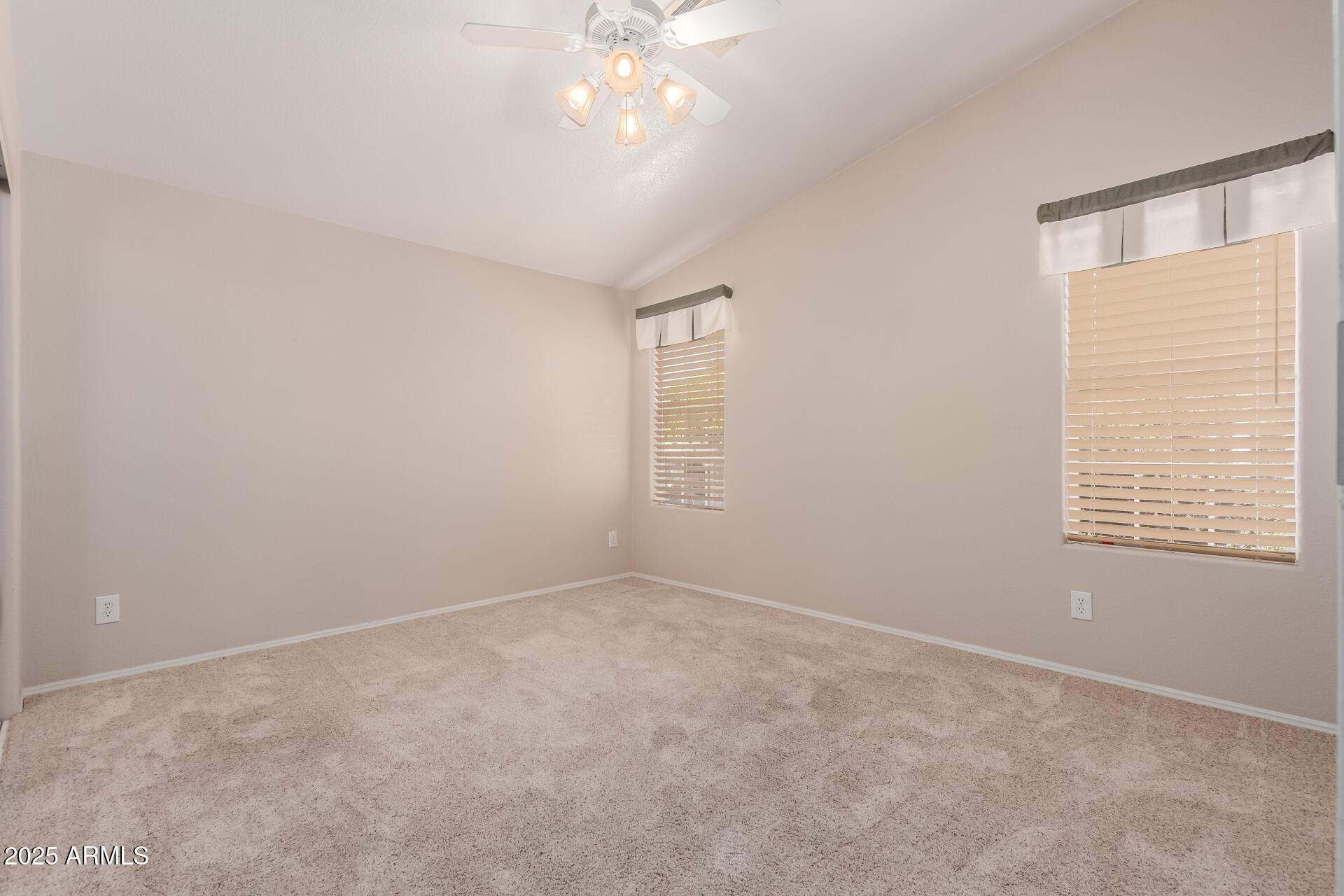 2550 South Ellsworth Road, Unit 366 Mesa, AZ 85209 - Photo 18 of 27 a view of an empty room with a window