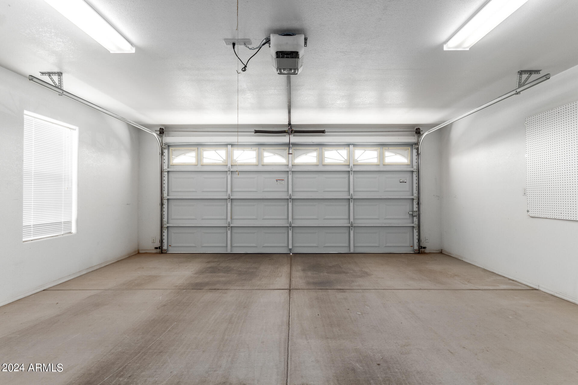 2550 South Ellsworth Road, Unit 366 Mesa, AZ 85209 - Photo 22 of 27 a view of a garage