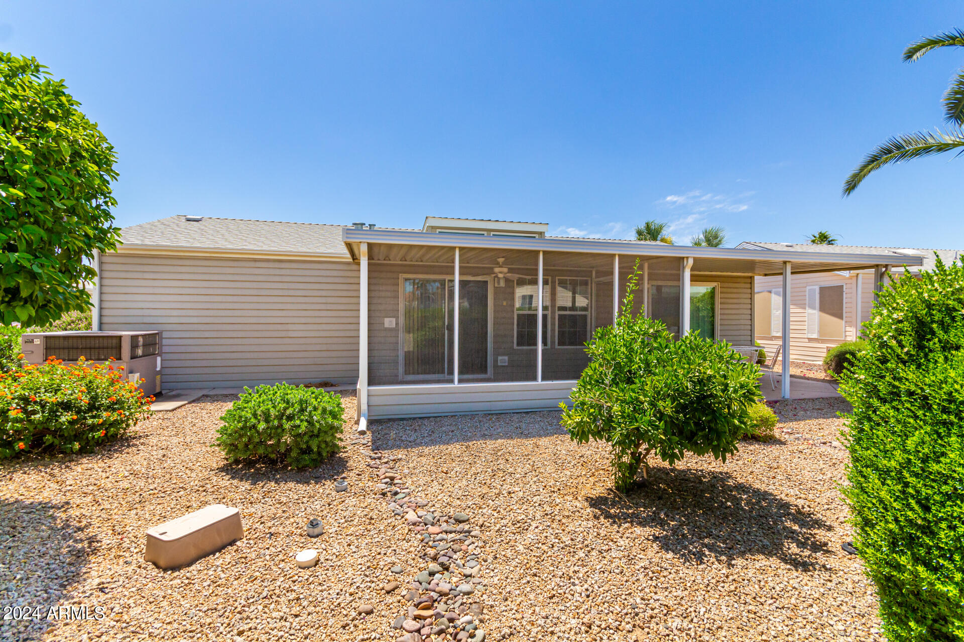 2550 South Ellsworth Road, Unit 366 Mesa, AZ 85209 - Photo 26 of 27 a house with a yard