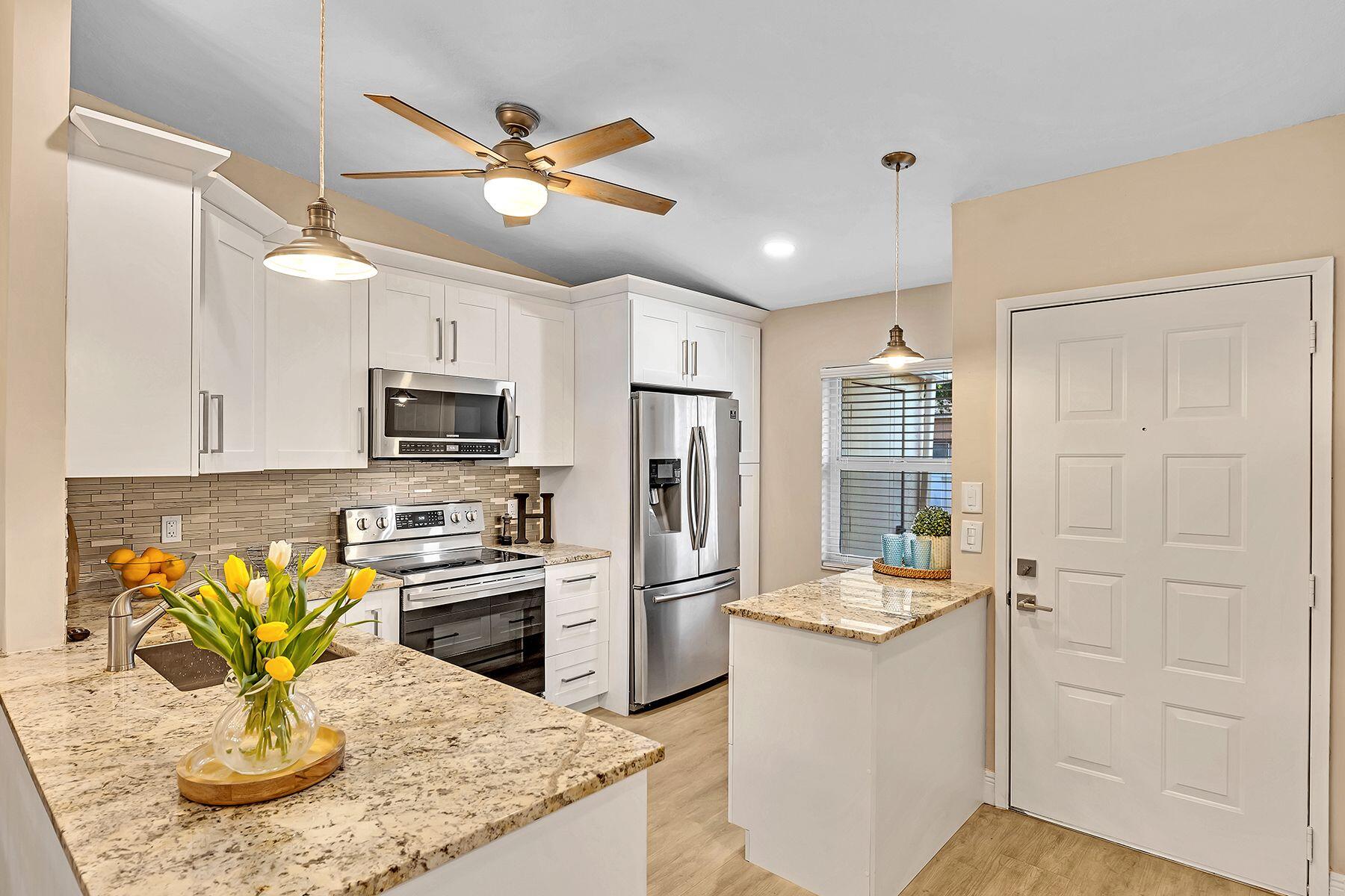 8693 Sunbird Place Boca Raton, FL 33496 - Photo 3 of 37 Updated Kitchen