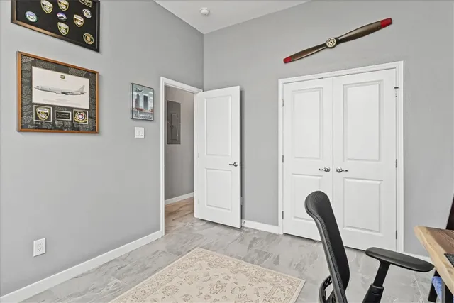 a view of a hallway with workspace