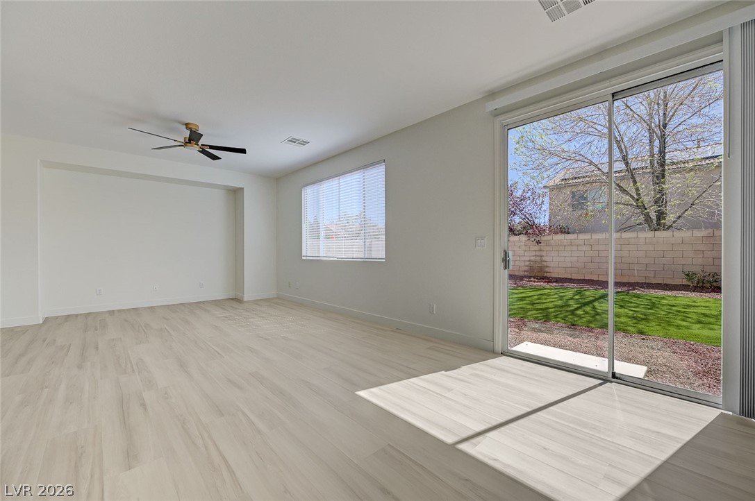 9687 Ridgebluff Avenue Las Vegas, NV 89148 - Photo 25 of 57 Spare room featuring light wood-type flooring and ceiling fan