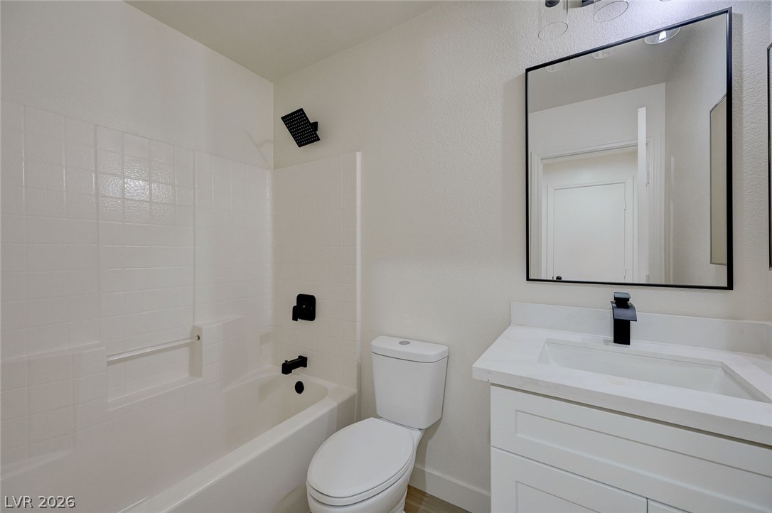 9687 Ridgebluff Avenue Las Vegas, NV 89148 - Photo 26 of 57 Bathroom with vanity and tub / shower combination