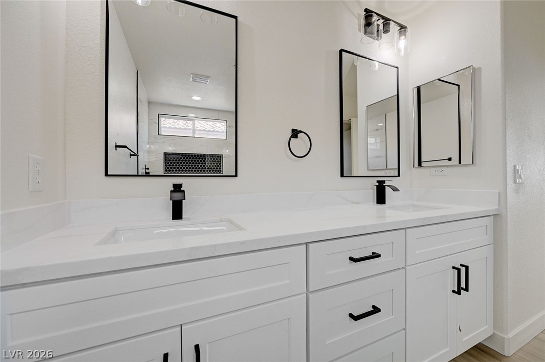 9687 Ridgebluff Avenue Las Vegas, NV 89148 - Photo 38 of 57 Full bath featuring double vanity