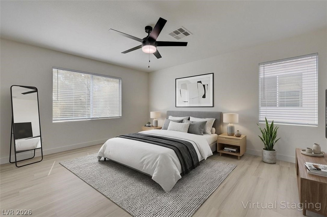 9687 Ridgebluff Avenue Las Vegas, NV 89148 - Photo 9 of 57 Bedroom with light wood-type flooring and ceiling fan