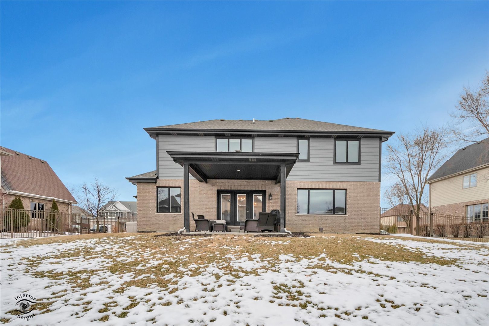 1973 Edgeview Drive New Lenox, IL 60451 - Photo 4 of 39 a front view of a house with a snow in the yard