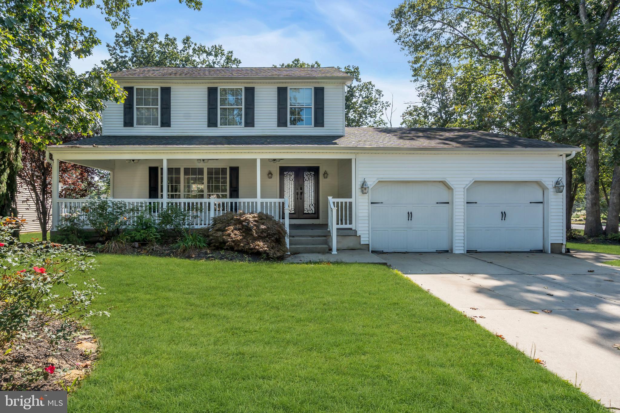 1 Crisfield Road Sicklerville, NJ 08081 - Photo 1 of 45 front view of a house with a garden and trees