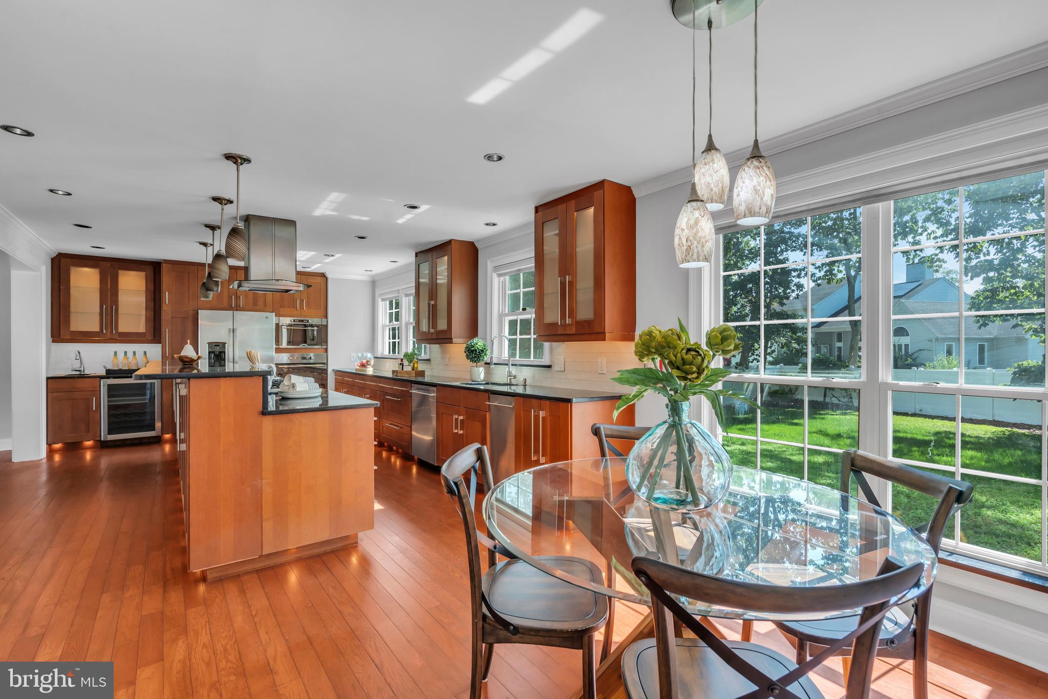 1 Crisfield Road Sicklerville, NJ 08081 - Photo 17 of 45 a dining room with furniture a chandelier and wooden floor