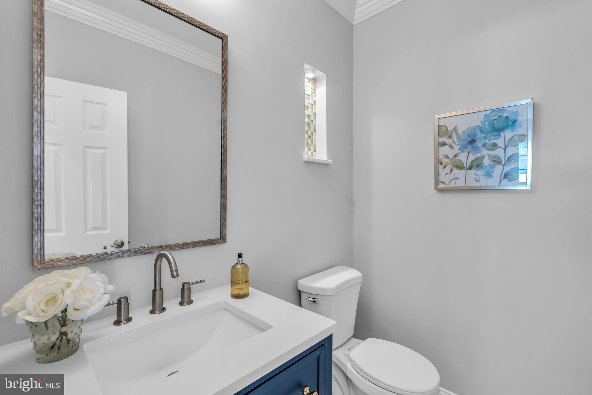 1 Crisfield Road Sicklerville, NJ 08081 - Photo 20 of 45 a bathroom with a toilet sink and mirror