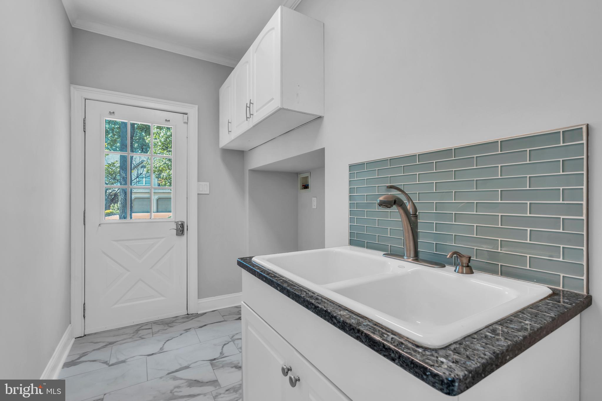 1 Crisfield Road Sicklerville, NJ 08081 - Photo 21 of 45 a bathroom with a sink a vanity and a mirror