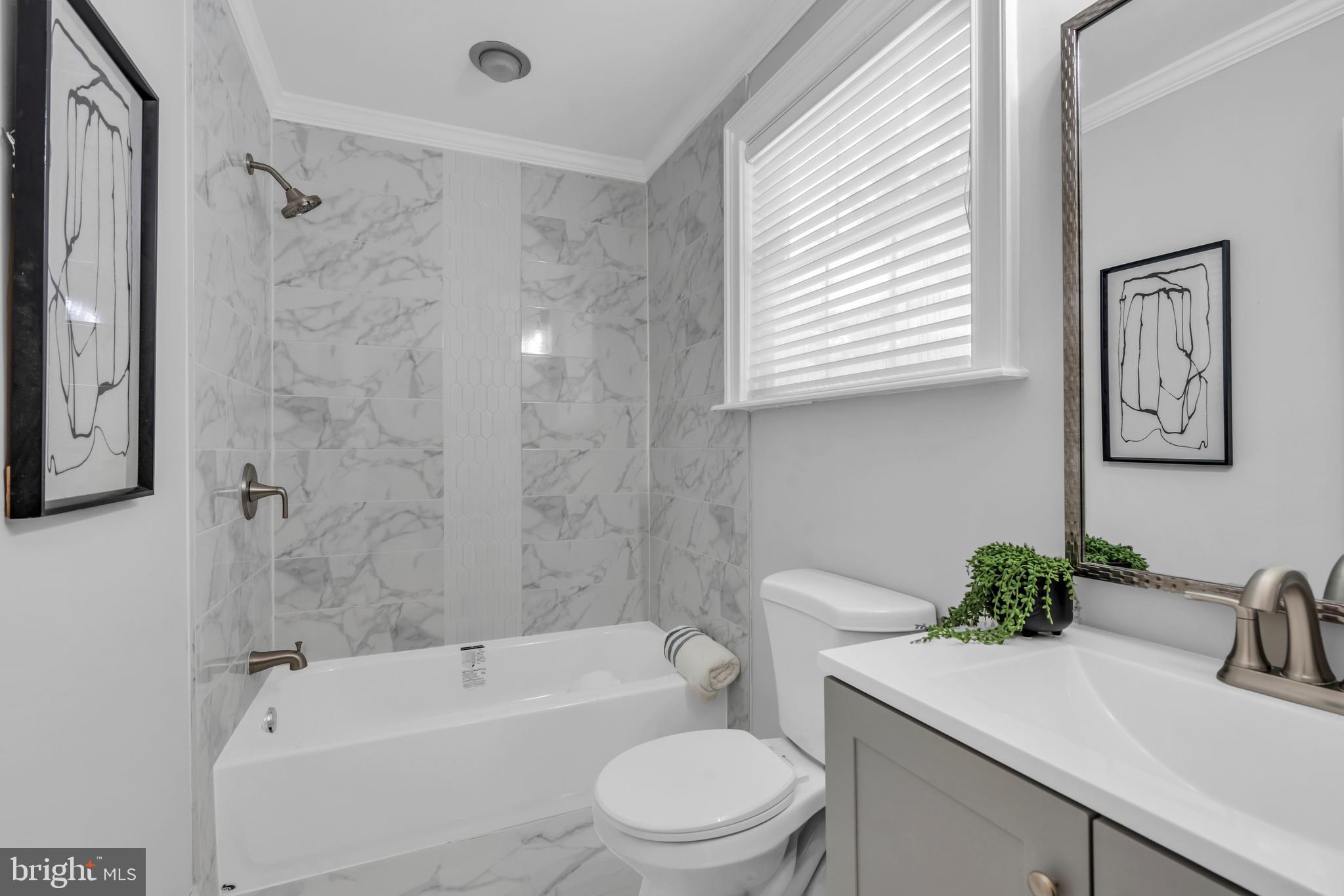 1 Crisfield Road Sicklerville, NJ 08081 - Photo 24 of 45 a bathroom with a sink a toilet and shower