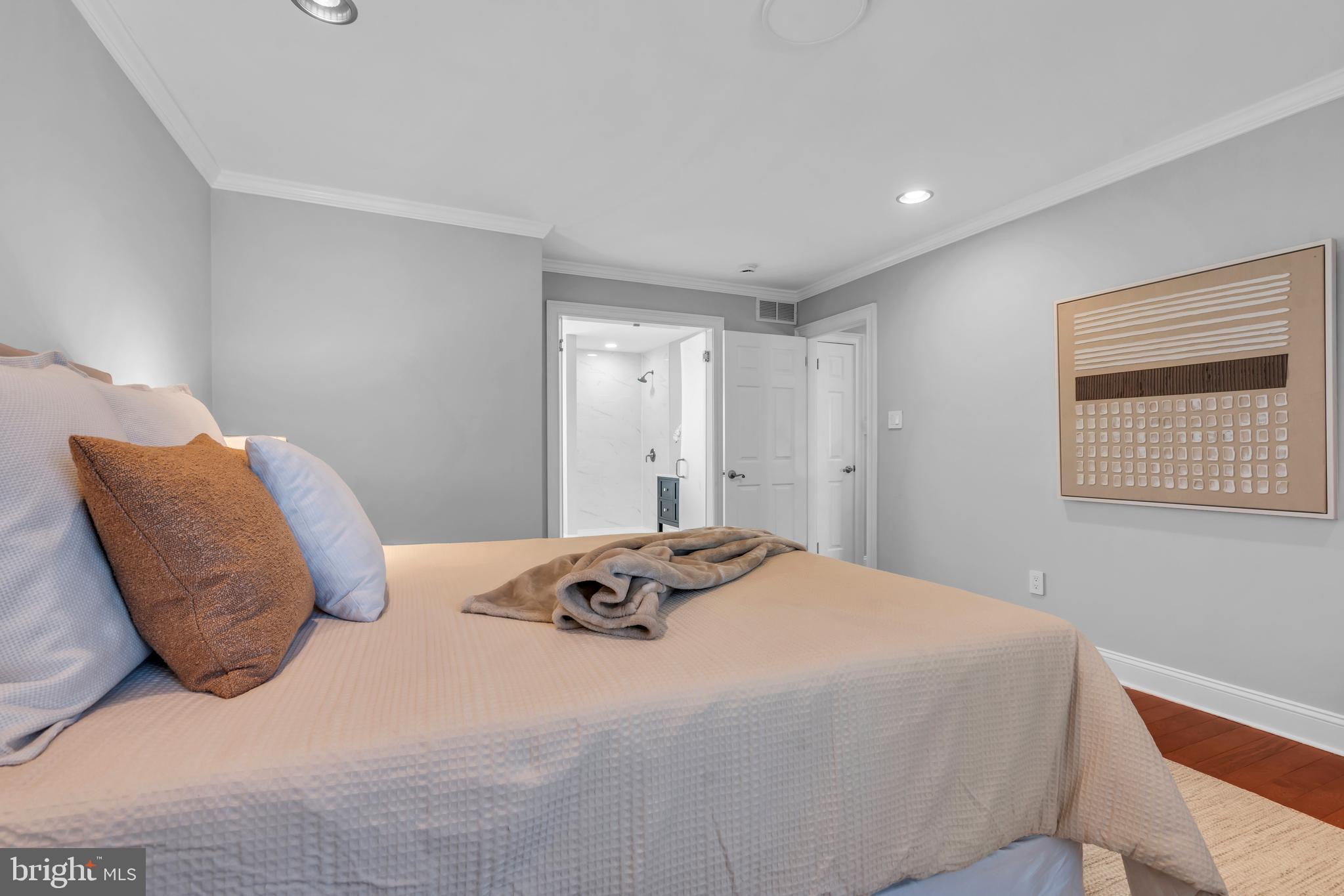 1 Crisfield Road Sicklerville, NJ 08081 - Photo 28 of 45 a bedroom with a bed and a painting on the wall