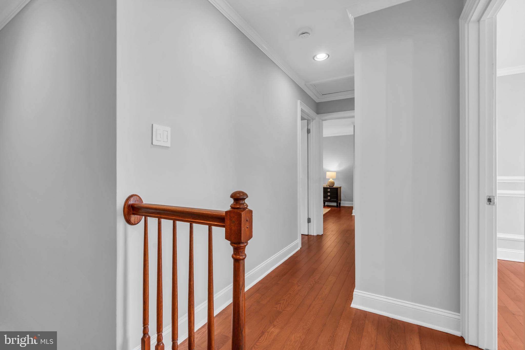 1 Crisfield Road Sicklerville, NJ 08081 - Photo 34 of 45 a view of a hallway with wooden floor and staircase