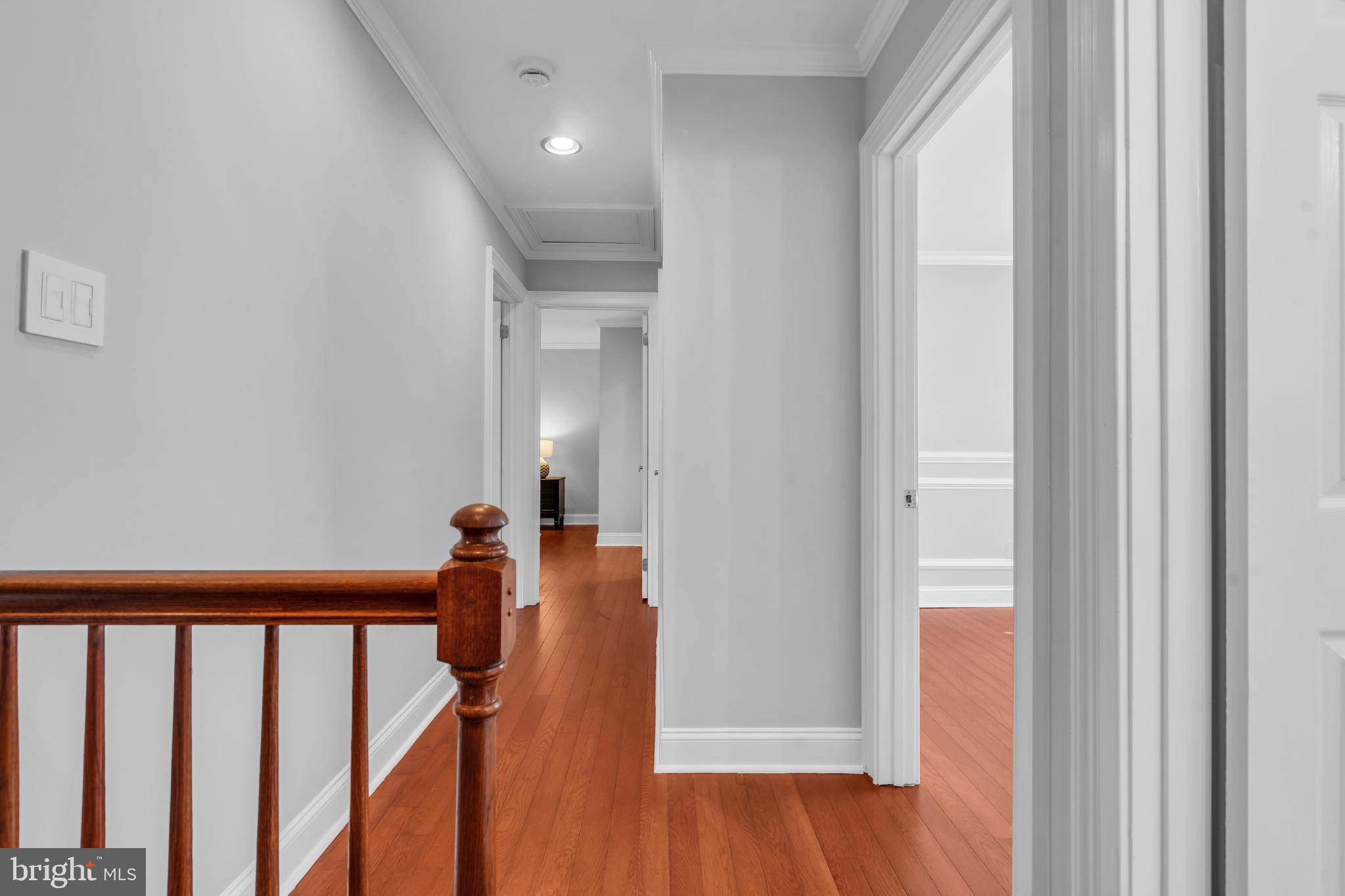 1 Crisfield Road Sicklerville, NJ 08081 - Photo 35 of 45 a view of a hallway with wooden floor and stairs