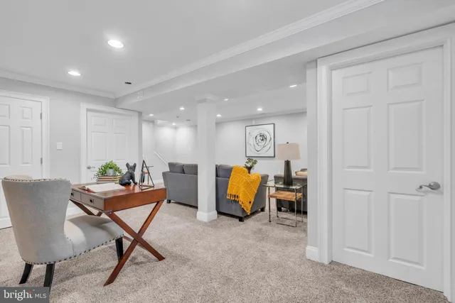 a room with furniture and air hockey table
