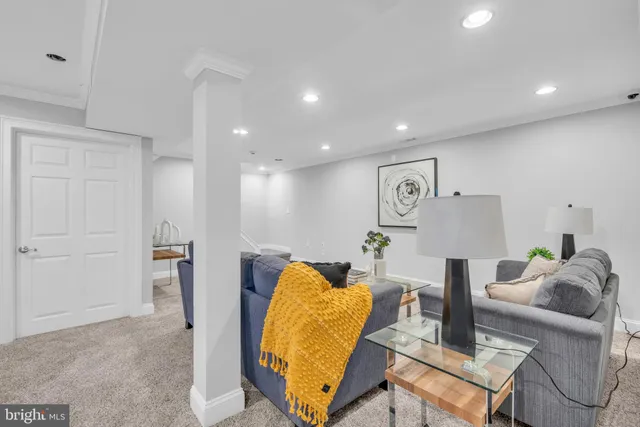 a living room with furniture and a table