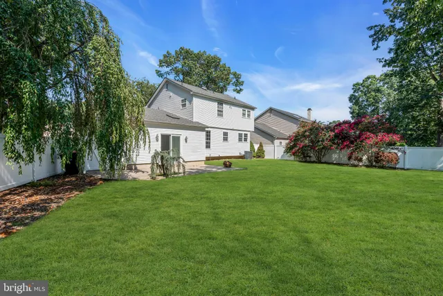 a view of a house with a big yard
