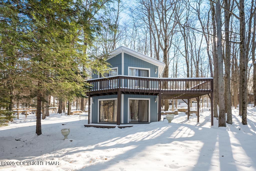 136 Netcong Circle Pocono Lake, PA 18347 - Photo 11 of 40 a front view of a house with a garden