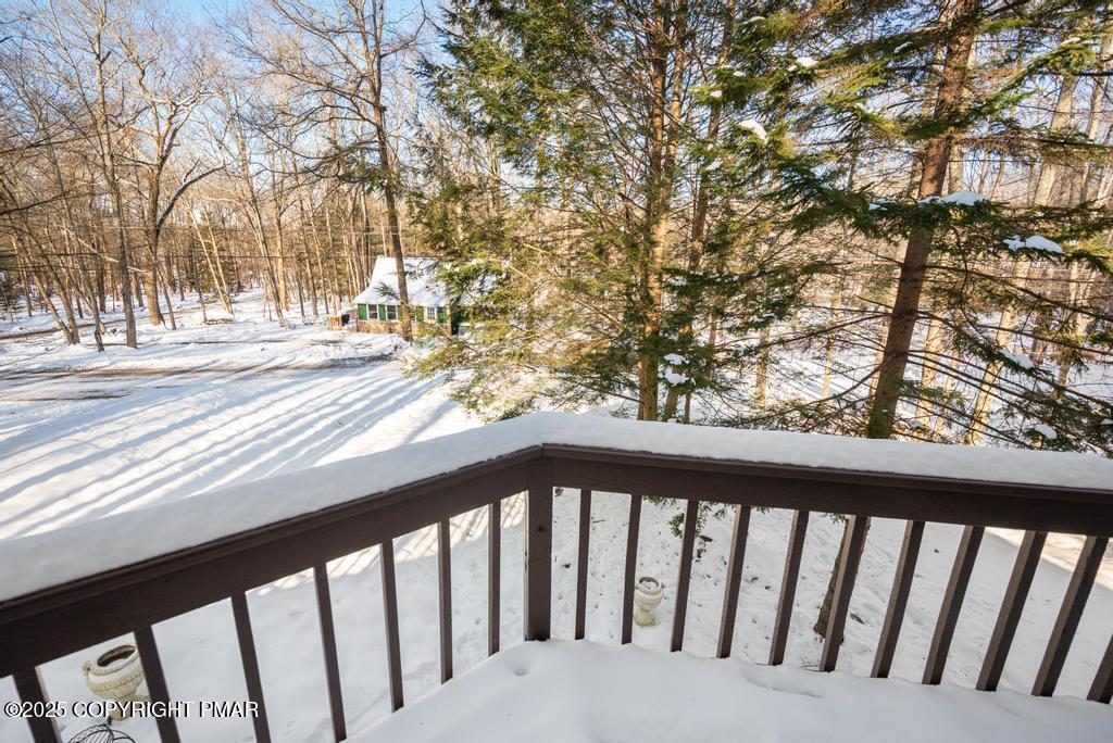 136 Netcong Circle Pocono Lake, PA 18347 - Photo 14 of 40 a view of a wooden fence from a window