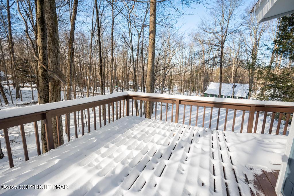 136 Netcong Circle Pocono Lake, PA 18347 - Photo 16 of 40 a balcony with trees