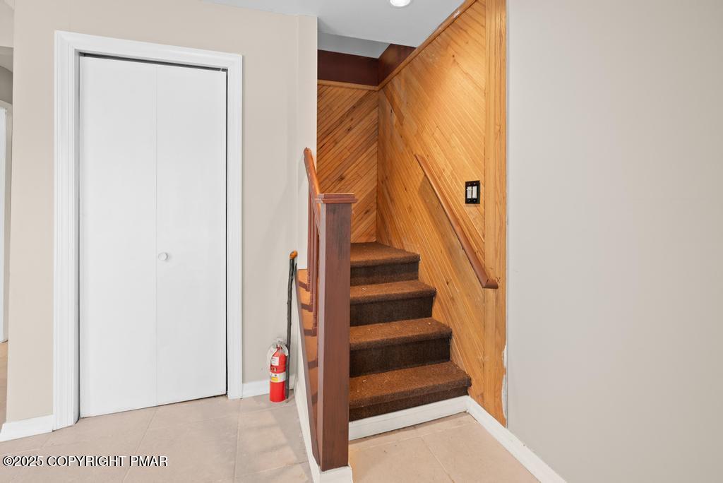 136 Netcong Circle Pocono Lake, PA 18347 - Photo 18 of 40 a view of a hallway with staircase