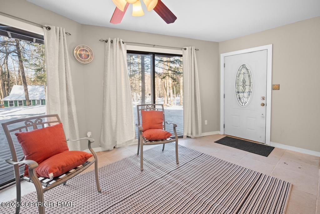 136 Netcong Circle Pocono Lake, PA 18347 - Photo 20 of 40 a bedroom with furniture and wooden floor