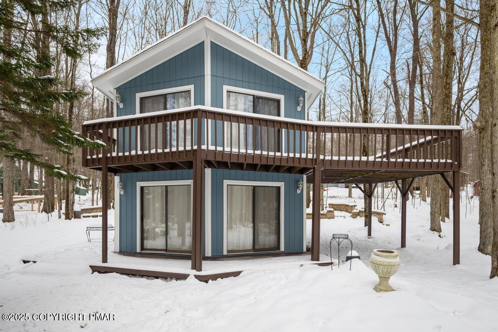 136 Netcong Circle Pocono Lake, PA 18347 - Photo 2 of 40 a front view of a house with balcony