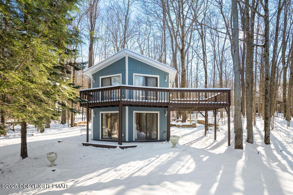 136 Netcong Circle Pocono Lake, PA 18347 - Photo 3 of 40 a front view of a house with a yard