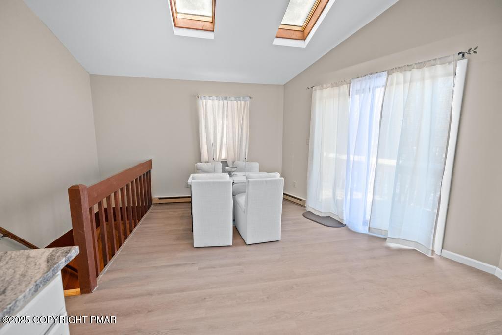 136 Netcong Circle Pocono Lake, PA 18347 - Photo 31 of 40 a view of a room with wooden floor and windows