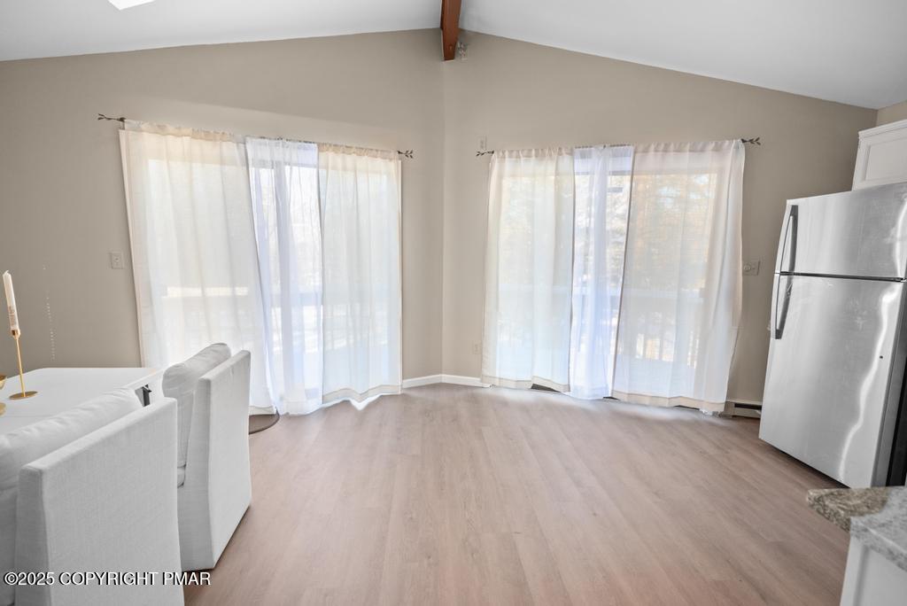 136 Netcong Circle Pocono Lake, PA 18347 - Photo 32 of 40 a view of kitchen with furniture and refrigerator