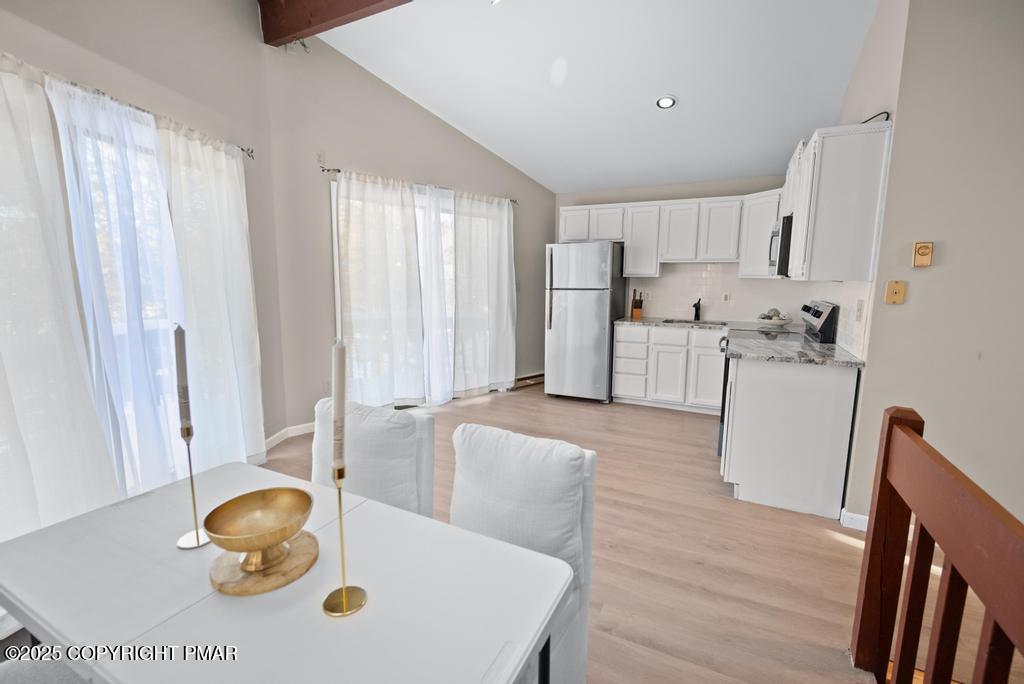 136 Netcong Circle Pocono Lake, PA 18347 - Photo 35 of 40 a living room with furniture and a wooden floor
