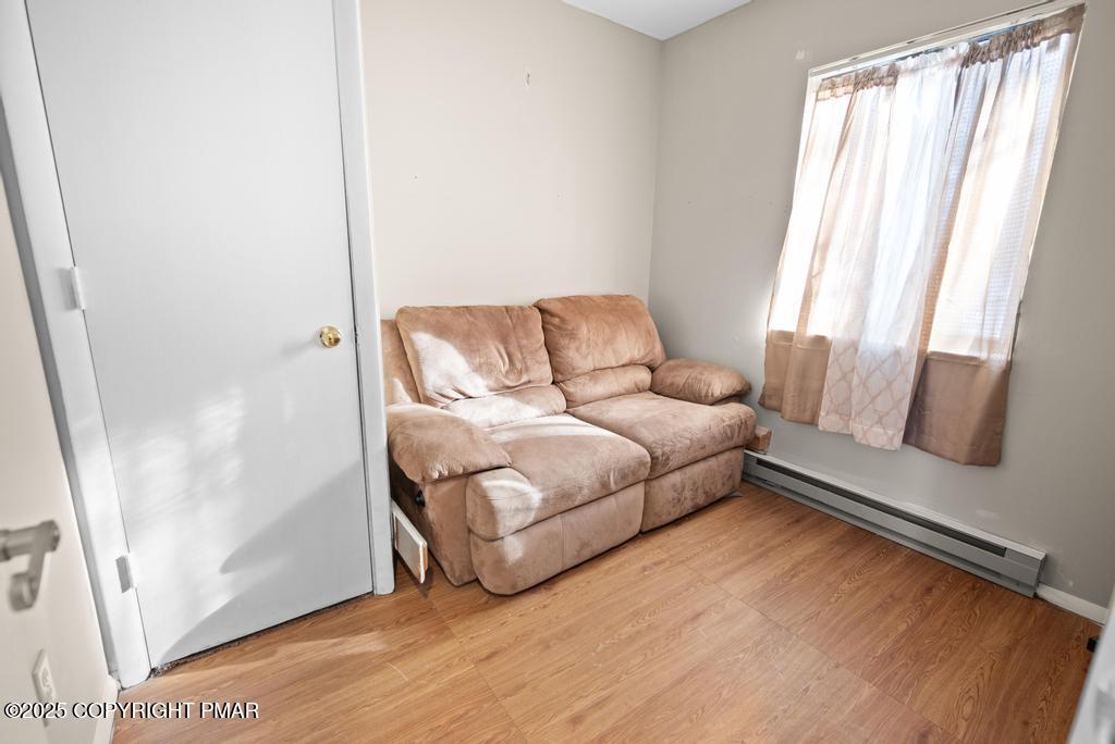 136 Netcong Circle Pocono Lake, PA 18347 - Photo 39 of 40 a living room with furniture and a window