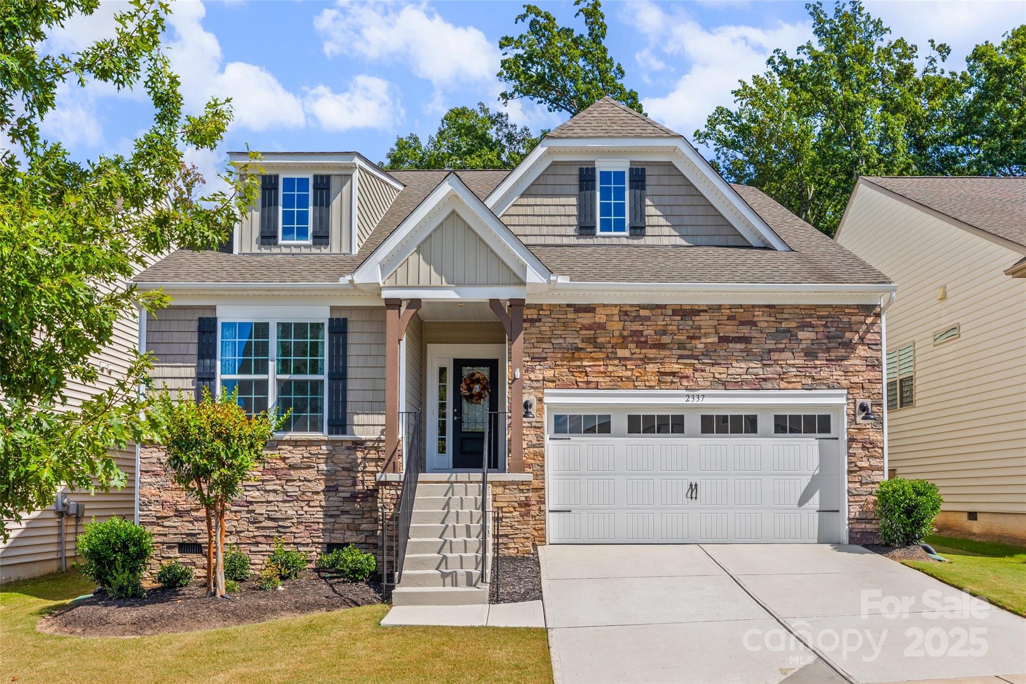 2337 Talon Point Circle Fort Mill, SC 29715 - Photo 1 of 48 a front view of a house with a yard