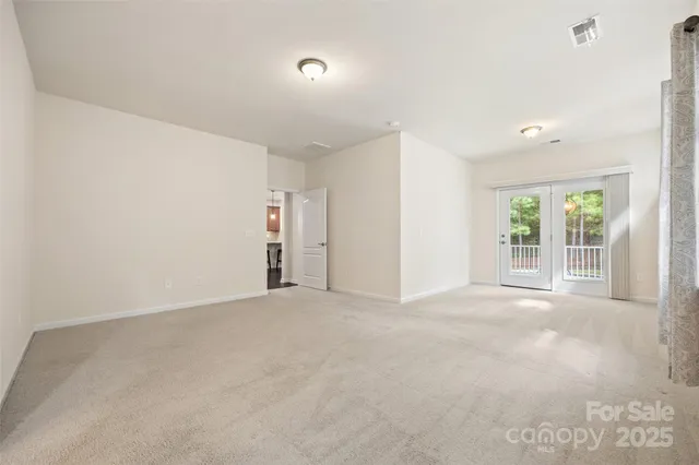 a bathroom with a granite countertop sink mirror and shower
