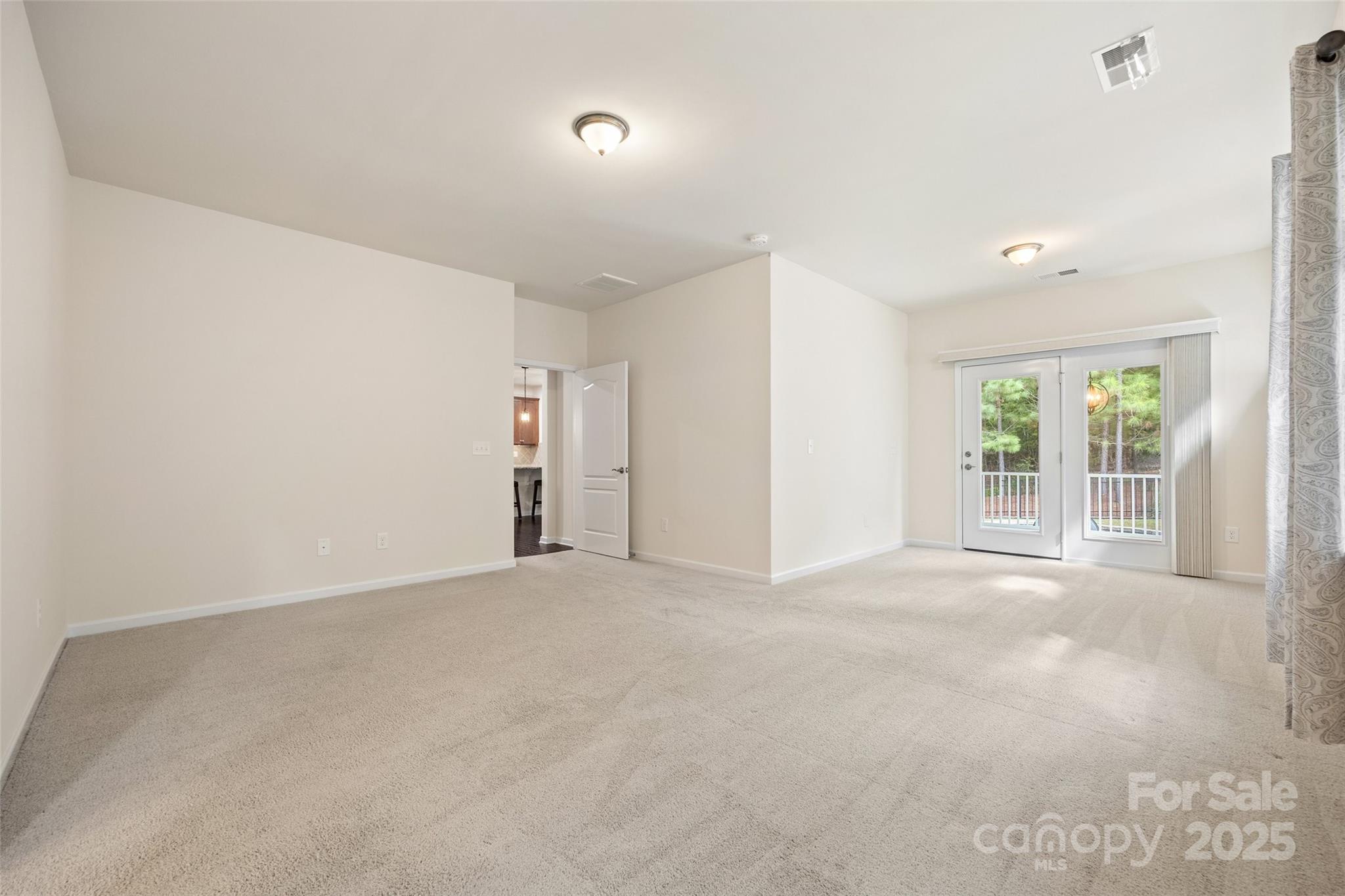 2337 Talon Point Circle Fort Mill, SC 29715 - Photo 23 of 48 wooden floor in an empty room with a window