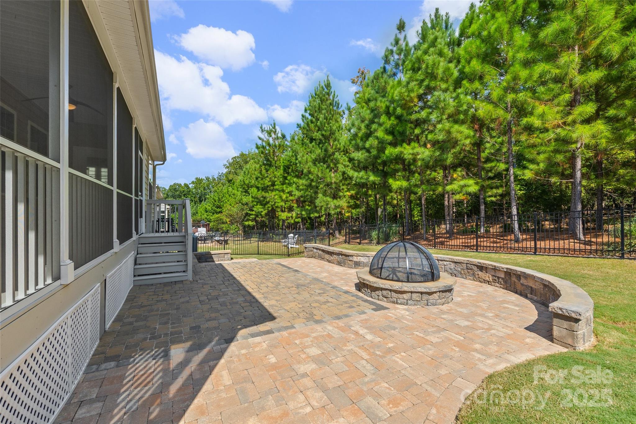 2337 Talon Point Circle Fort Mill, SC 29715 - Photo 28 of 48 a swimming pool with potted plants and large trees
