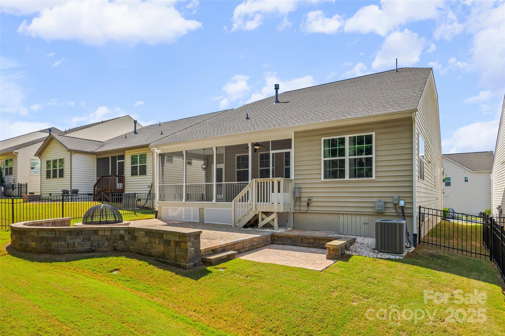 2337 Talon Point Circle Fort Mill, SC 29715 - Photo 30 of 48 a view of a house with swimming pool and couches chairs