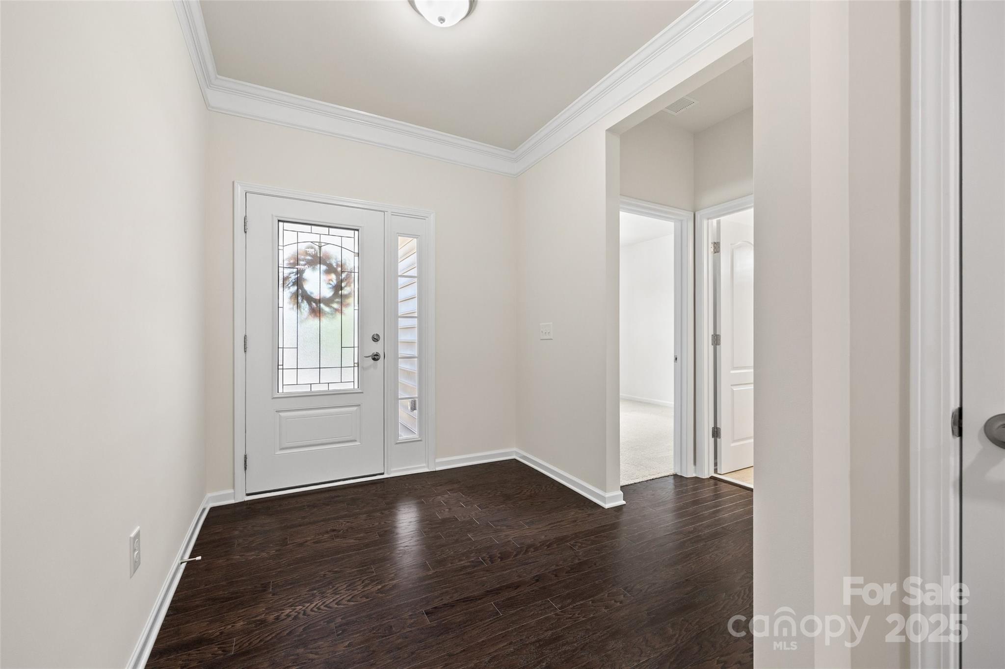 2337 Talon Point Circle Fort Mill, SC 29715 - Photo 3 of 48 an empty room with wooden floor and windows