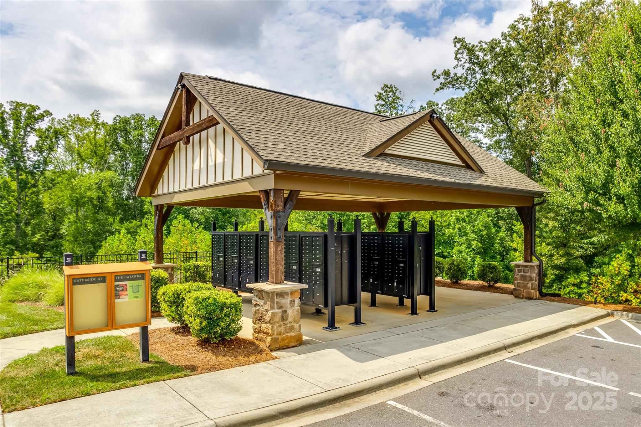 2337 Talon Point Circle Fort Mill, SC 29715 - Photo 36 of 48 a patio with a table and chairs and potted plants