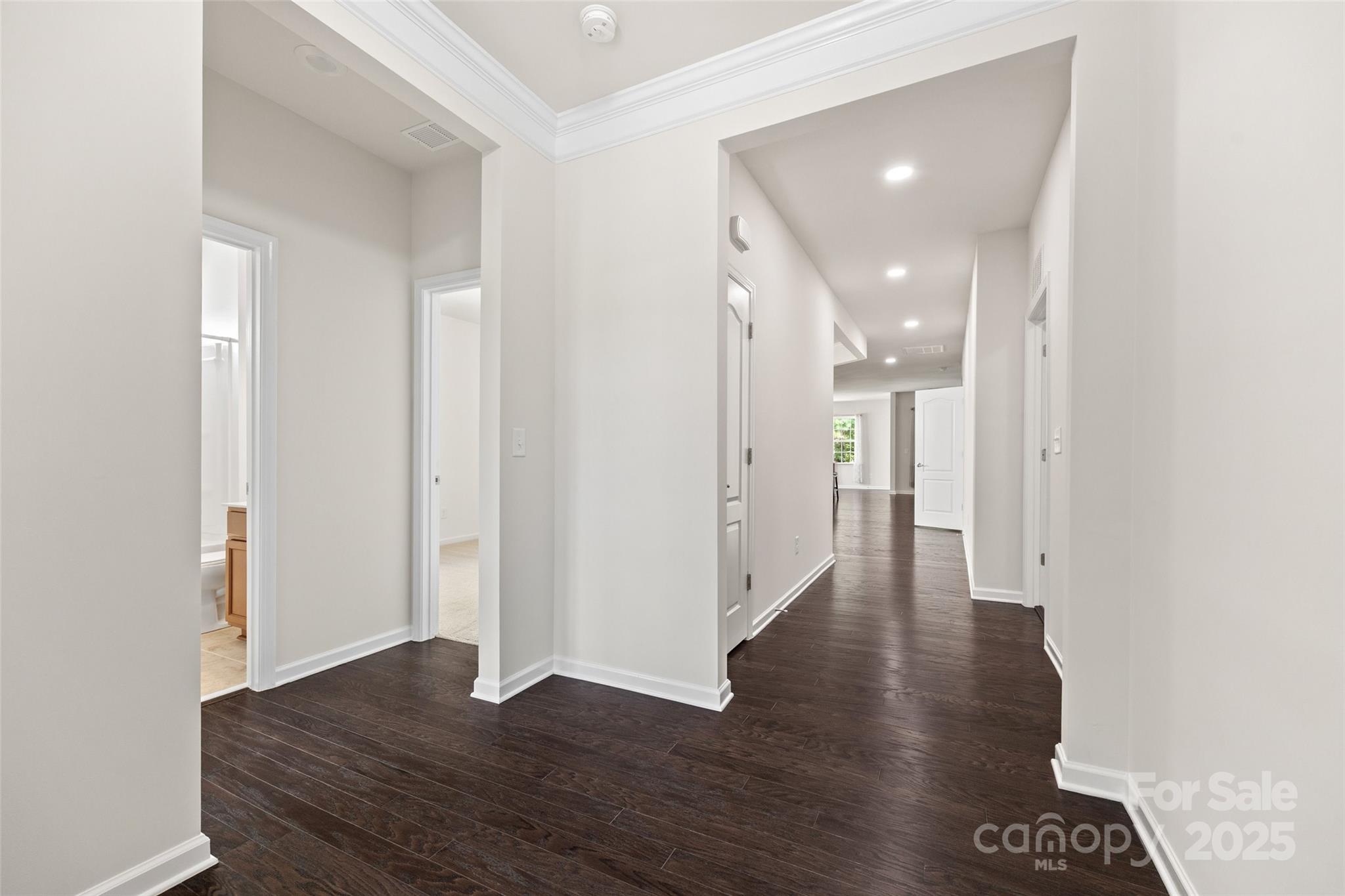 2337 Talon Point Circle Fort Mill, SC 29715 - Photo 4 of 48 a view of a hallway with wooden floor