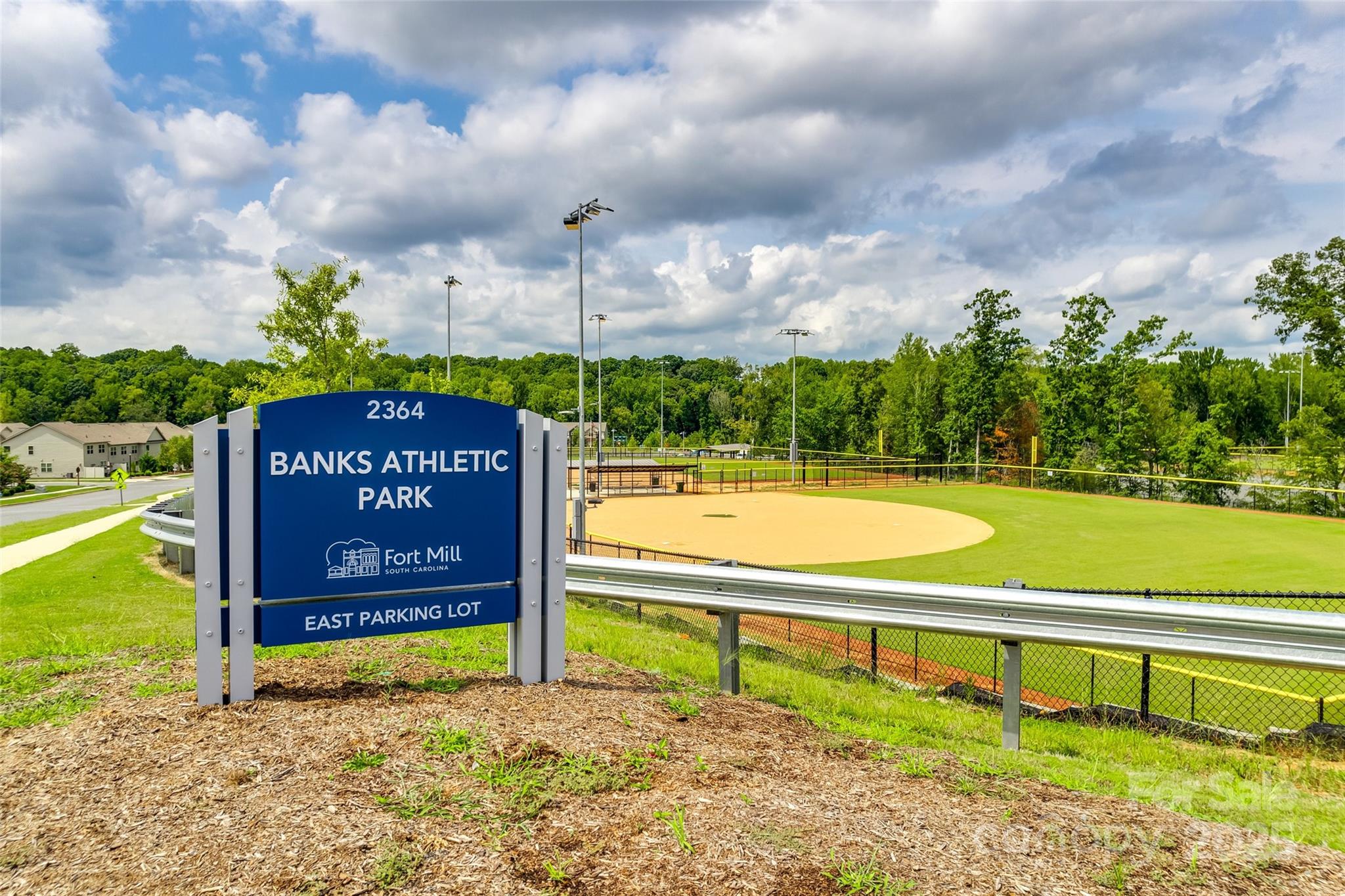2337 Talon Point Circle Fort Mill, SC 29715 - Photo 43 of 48 a view of a sign board with a park