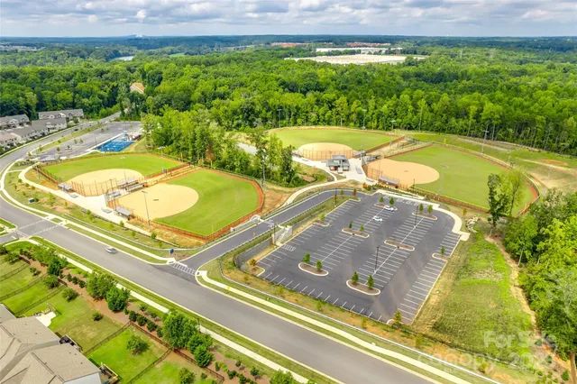 a view of a swimming pool with a garden