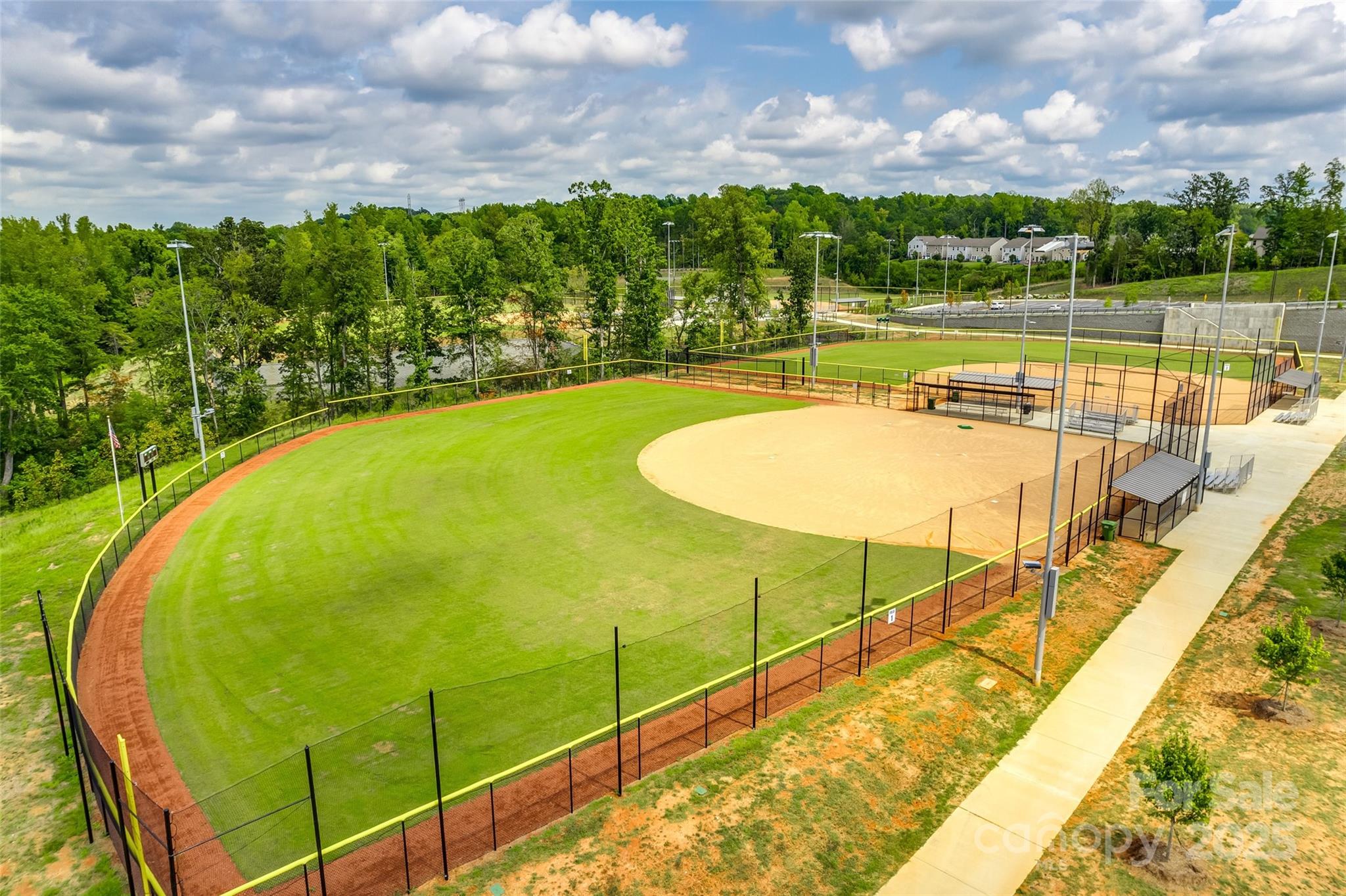 2337 Talon Point Circle Fort Mill, SC 29715 - Photo 45 of 48 a view of a swimming pool with a patio and a yard