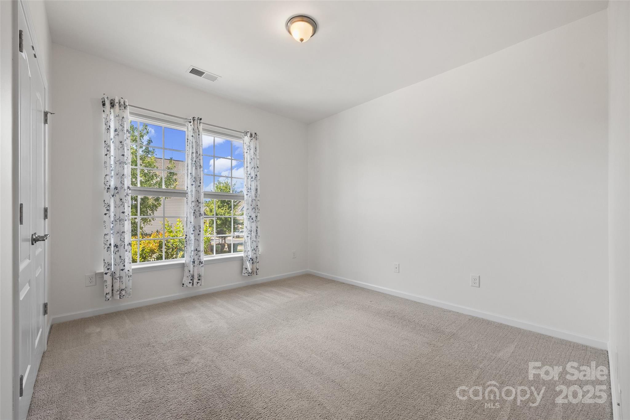 2337 Talon Point Circle Fort Mill, SC 29715 - Photo 5 of 48 a view of an empty room with a window