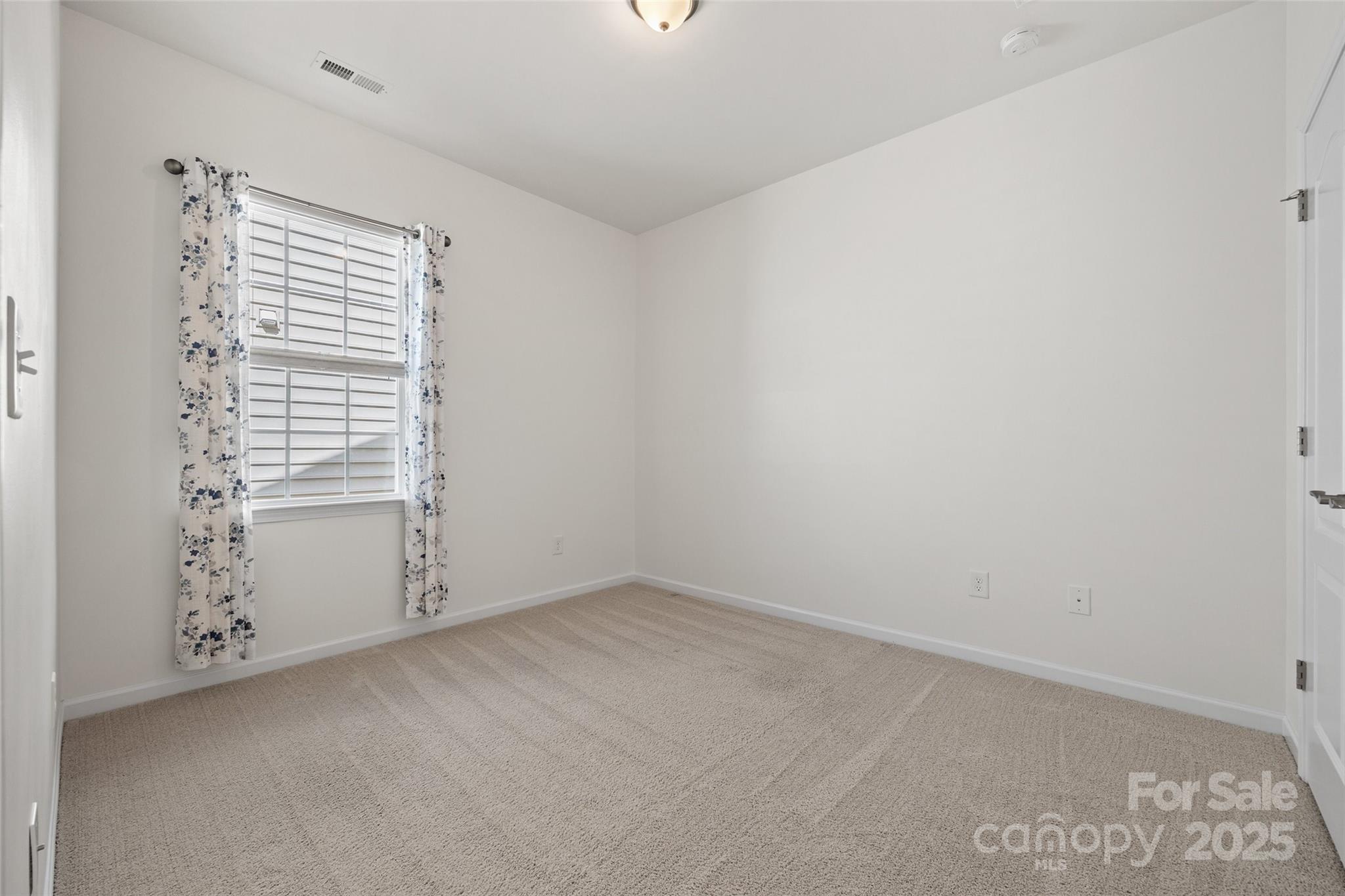 2337 Talon Point Circle Fort Mill, SC 29715 - Photo 7 of 48 an empty room with windows